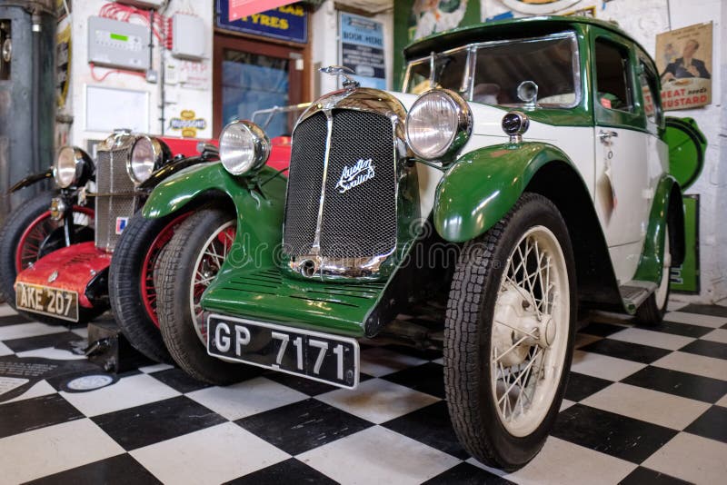 BOURTON-ON-THE-WATER, GLOUCESTERSHIRE/UK - MARCH 24 : Austin Swallow in the Motor Museum at Bourton-on-the-Water in royalty free stock images BOURTON-ON-THE-WATER, GLOUCESTERSHIRE/UK - MARCH 24 : Austin Swallow in the Motor Museum at Bourton-on-the-Water in royalty free stock images