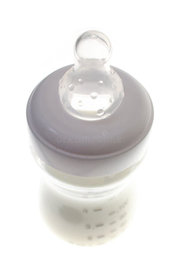 Bouteille de chéri, infirmière de trayon de lait photo libre de droits Bouteille de chéri, infirmière de trayon de lait photo libre de droits