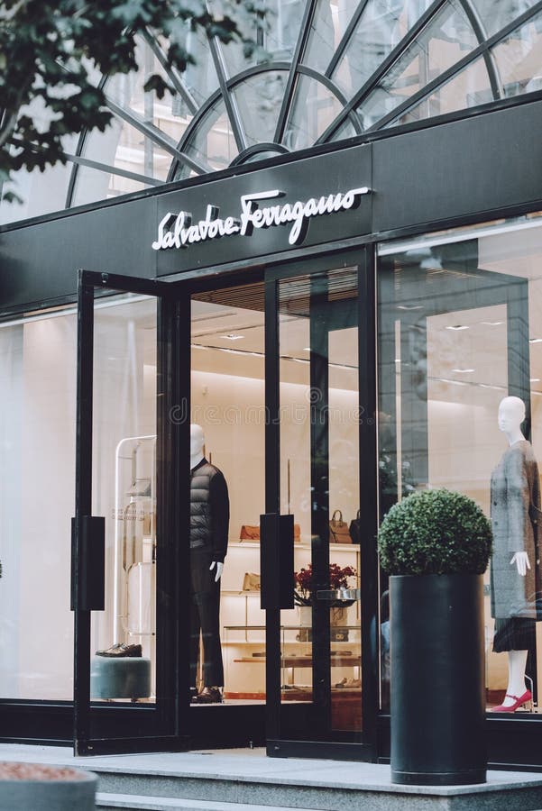 Salvatore Ferragamo boutique. Signboard logo brend sign of Salvatore Ferragamo store, shop, mall, boutique. Kiev, Ukraine - September 02, 2019, brand, business, center, centre, city, clothes, clothing, commerce, commercial, company, design, designer, editorial, emanuele, expensive, famous, fashion, fashionable, franchise, glamor, galleria, inside, interior, italian, italy, lifestyle, luxurious, luxury, market, milan, milano, outlet, retail, rich, street, textile, wealth, upper, class, window, display, vip. Salvatore Ferragamo boutique. Signboard logo brend sign of Salvatore Ferragamo store, shop, mall, boutique. Kiev, Ukraine - September 02, 2019, brand, business, center, centre, city, clothes, clothing, commerce, commercial, company, design, designer, editorial, emanuele, expensive, famous, fashion, fashionable, franchise, glamor, galleria, inside, interior, italian, italy, lifestyle, luxurious, luxury, market, milan, milano, outlet, retail, rich, street, textile, wealth, upper, class, window, display, vip