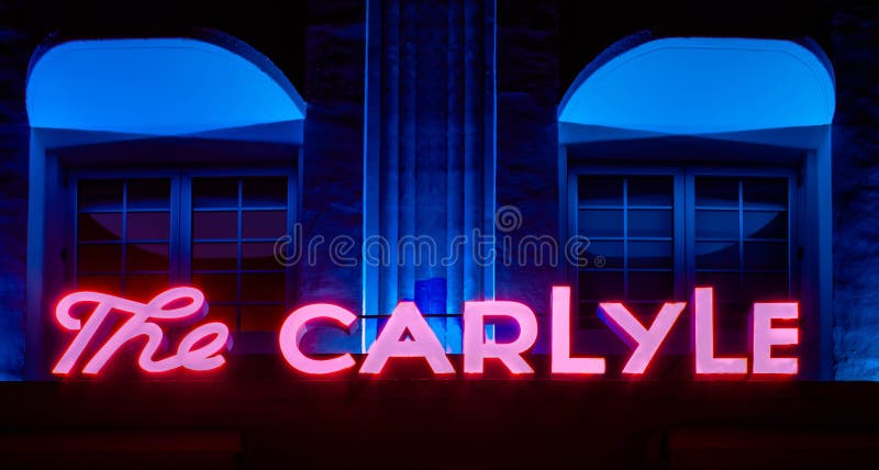 Miami Beach, Florida. June 29, 2021. Top view of colorful The Carlyle hotel sign in Ocean Drive 3. Miami Beach, Florida. June 29, 2021. Top view of colorful The Carlyle hotel sign in Ocean Drive 3