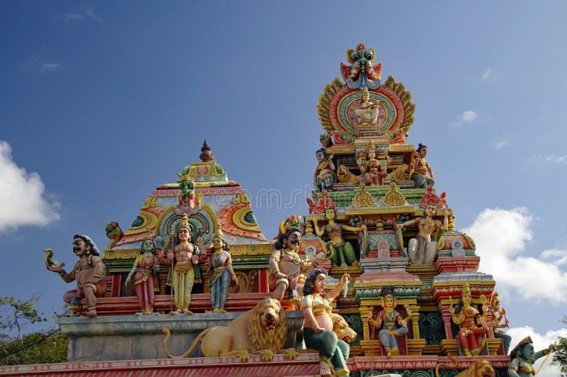 Top of an ancient Hindu temple in Mauritius Island. Mauritius, an Indian Ocean island nation, is known for its beaches lagoons and reefs. Top of an ancient Hindu temple in Mauritius Island. Mauritius, an Indian Ocean island nation, is known for its beaches lagoons and reefs