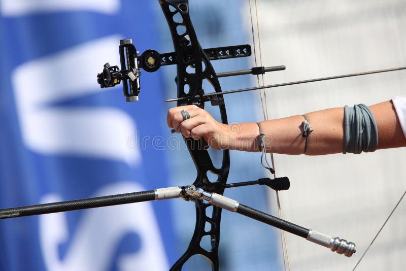 Bow and arrow in the hands of an archer royalty free stock photo Bow and arrow in the hands of an archer royalty free stock photo