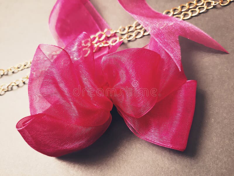 Bow ties and gold chains stock photo. Image of golden 203612368