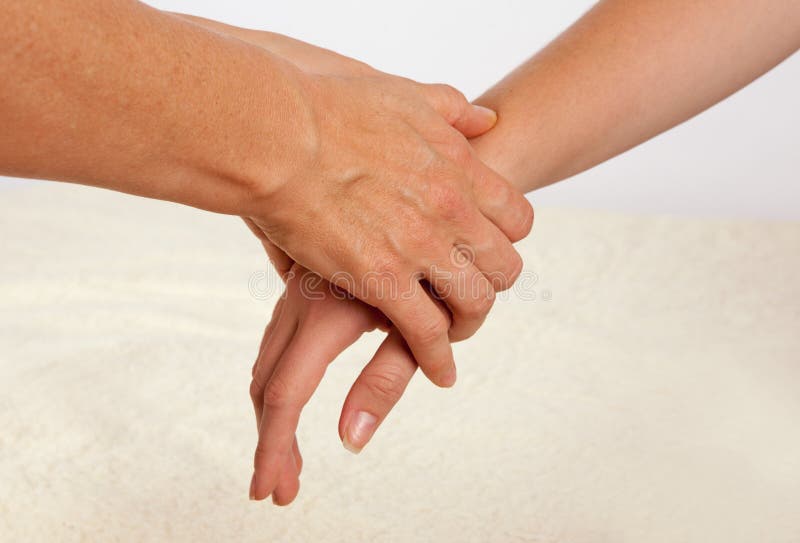 Bowen massage treatment of a hand stock photography