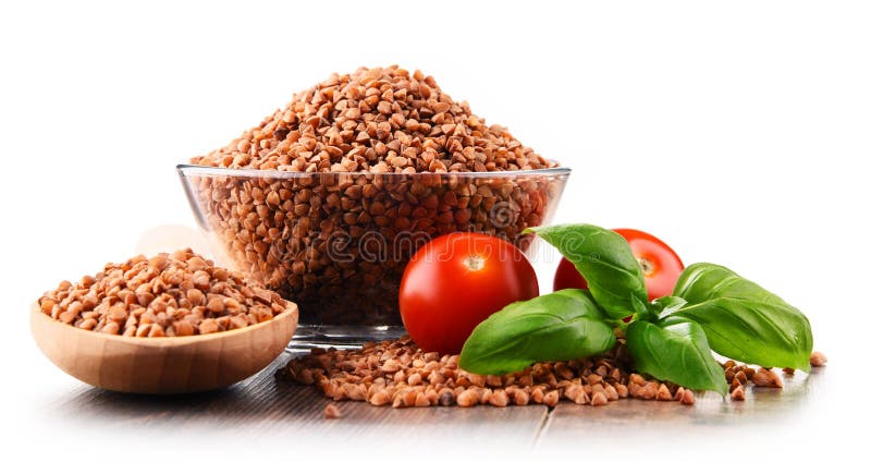 Bowl of buckwheat kasha isolated on white