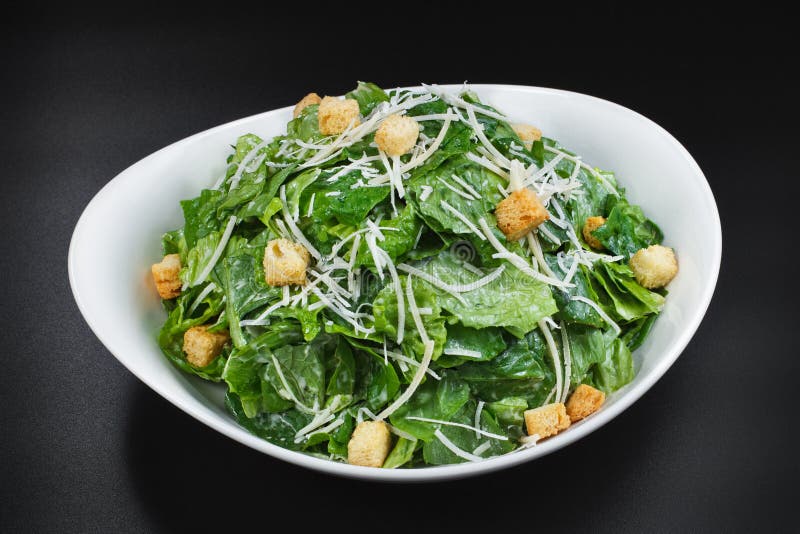 Bowl of Caesar Salad stock image. Image of condiment - 34073691