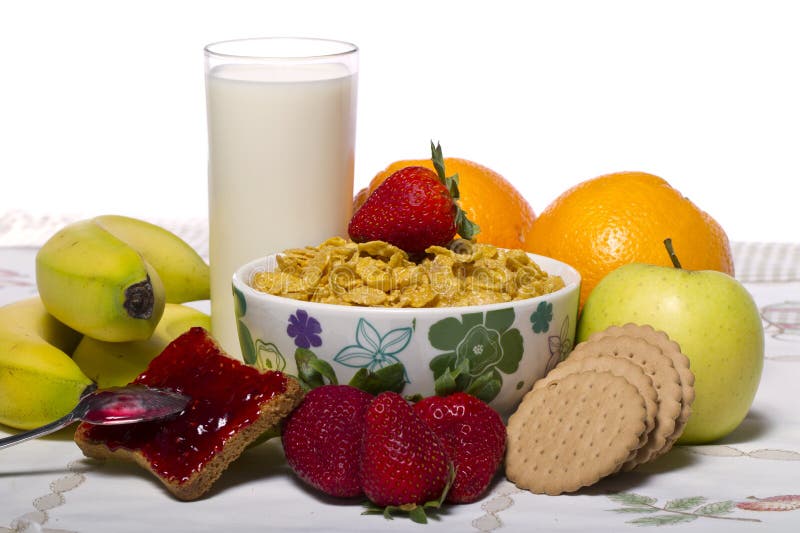 Bowl of cereals with fruit and milk