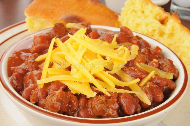 Bowl of chili with cheese stock photo. Image of cheese 46178626