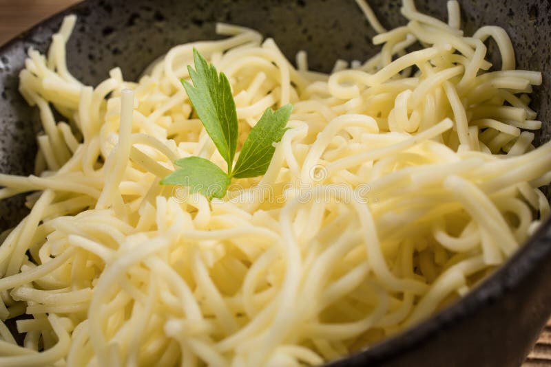 Bowl of cooked noodles stock photo. Image of pasta, bowl 165013298