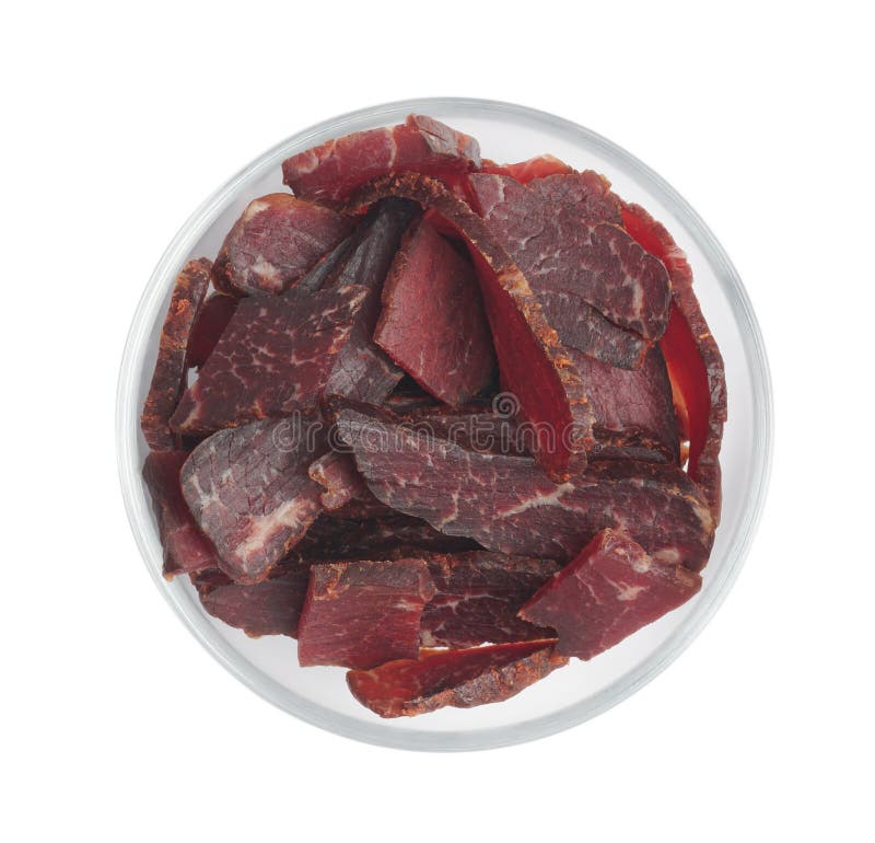 Bowl of Delicious Beef Jerky Isolated on White, Top View Stock Photo