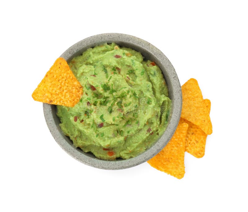 Bowl of delicious guacamole and nachos chips isolated on white, top view stock images