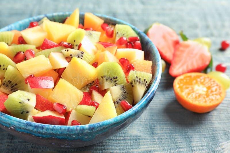 Bowl with fresh cut fruits stock photo. Image of object 112625158