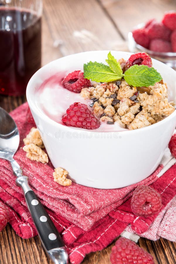 Bowl with fresh made Raspberry Yogurt stock images