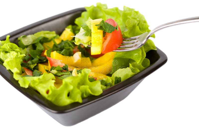 Bowl of fresh salad and fork