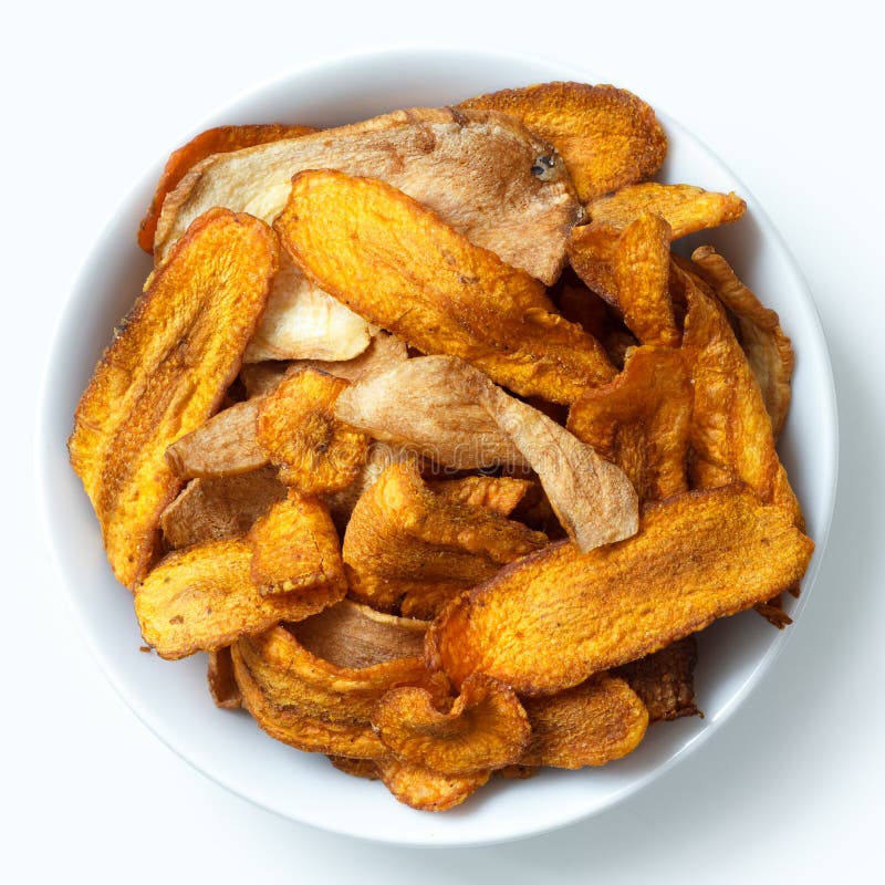 Bowl of Fried Carrot and Parsnip Chips. Isolated from Above. Stock