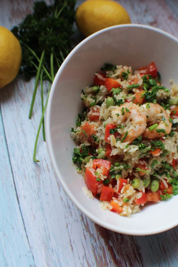 A Bowl of Fried Rice with Vegetables and Shrimp Stock Photo - Image of