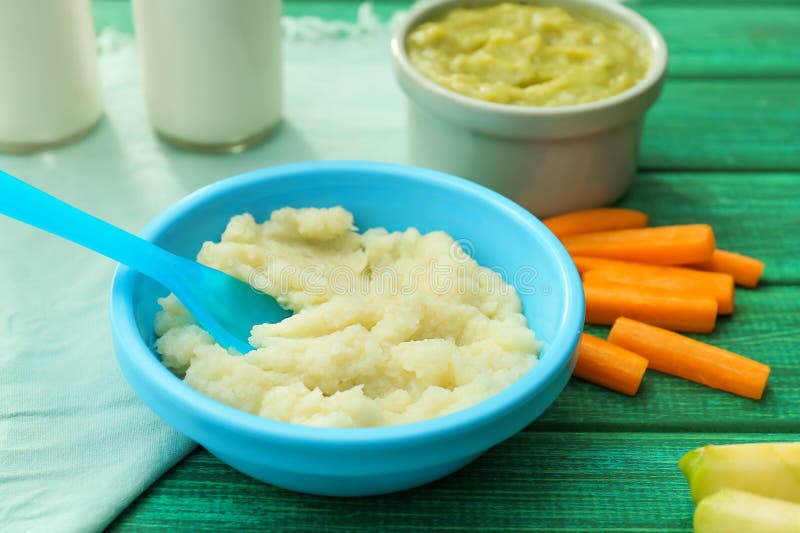 Bowl with Healthy Baby Food on Kitchen Table Stock Image Image of