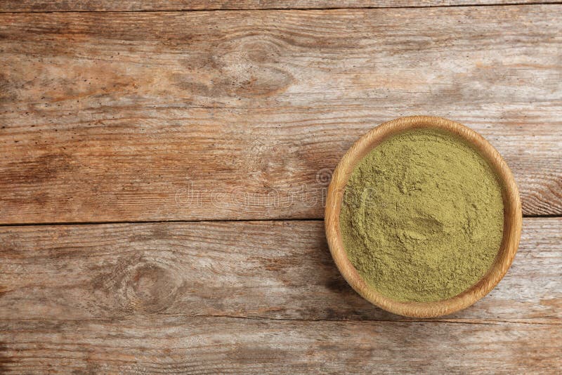 Bowl With Hemp Protein Powder On Wooden Table Top View Stock