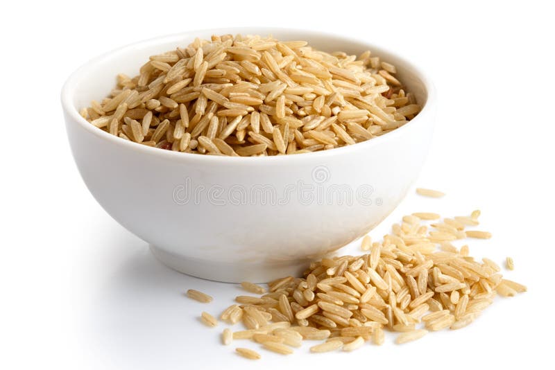 Bowl of long grain brown rice isolated on white.