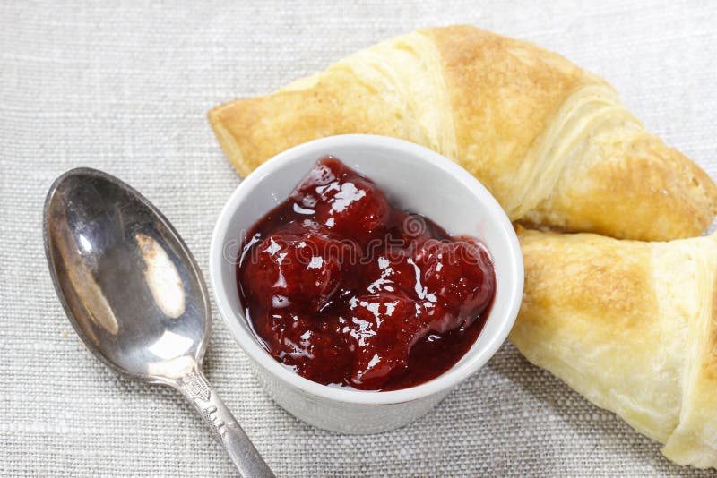 Bowl of Marmalade, Croissants and Silver Spoon Stock Photo - Image of ...