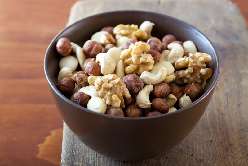 Bowl with nuts stock image. Image of walnuts, hazelnuts 14984443