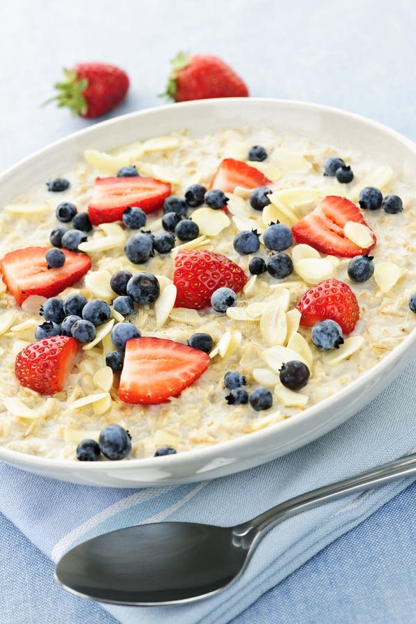 Bowl of Oatmeal with Berries Stock Photo Image of bright, spoon 16125990