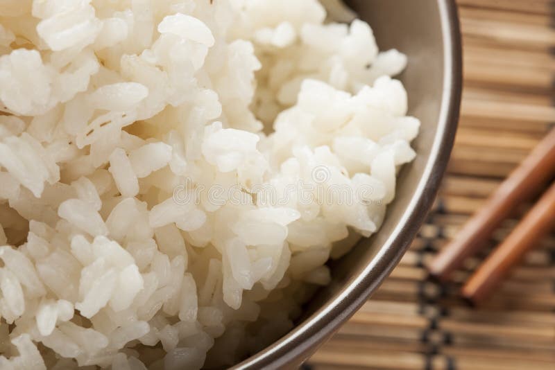 Bowl of Organic White Rice stock photo. Image of pile 28685438