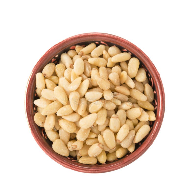 Bowl of Pine Nuts Isolated stock photo. Image of kernel 49135658