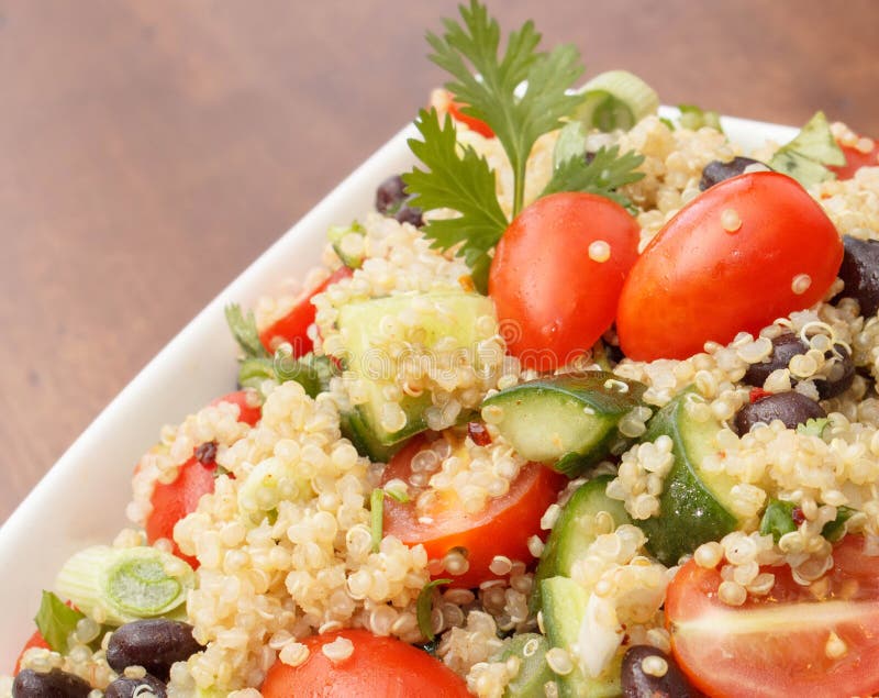 Closeup of healthy quinoa salad with fresh vegetables