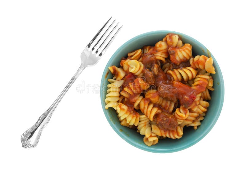 Bowl of Rotini in a Sausage and Pasta Sauce with a Fork Stock Photo