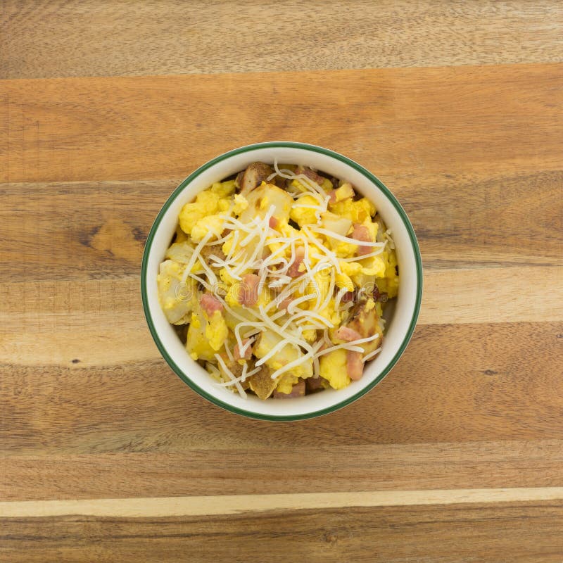 Bowl of Scrambled Eggs with Potatoes and Ham Stock Photo Image of eggs, cheese 117136676