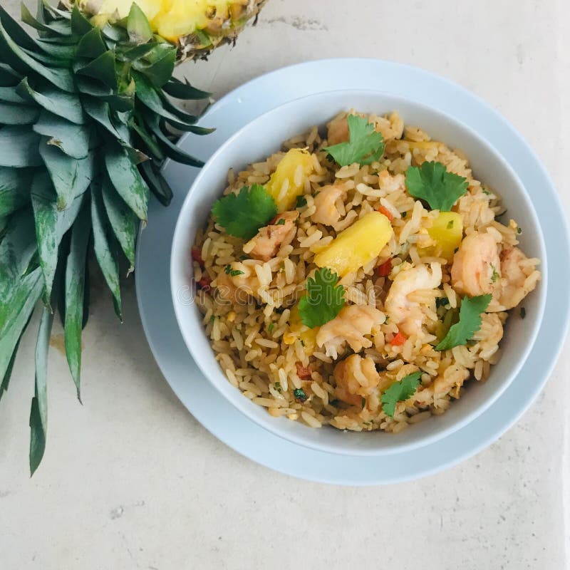 A Bowl of Shrimp and Pineapple Fried Rice Stock Photo - Image of flower