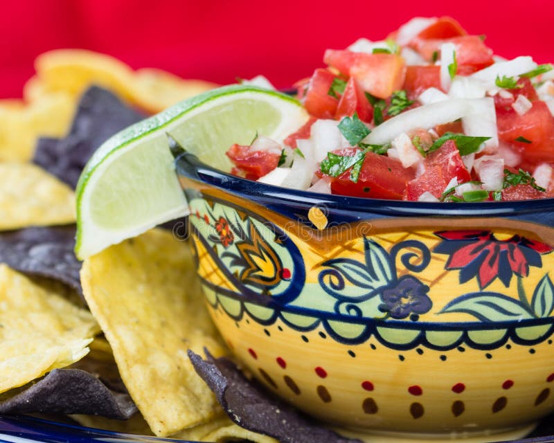 Bowl of spicy salsa and corn chips