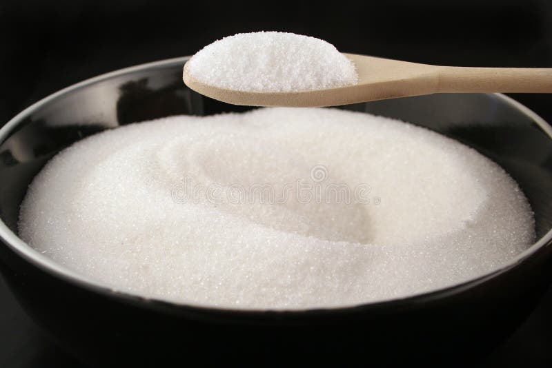Bowl of sugar with spoon