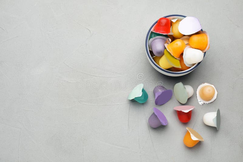 Bowl with Tasty Bright Jelly Cups on Light Table, Flat Lay. Space for