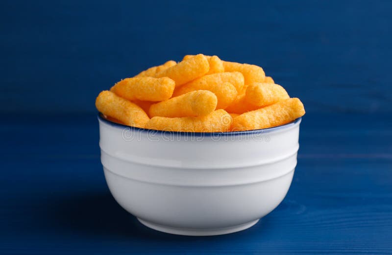 Premium PSD  Cheese puffs with a white bowl isolated on transparent  background