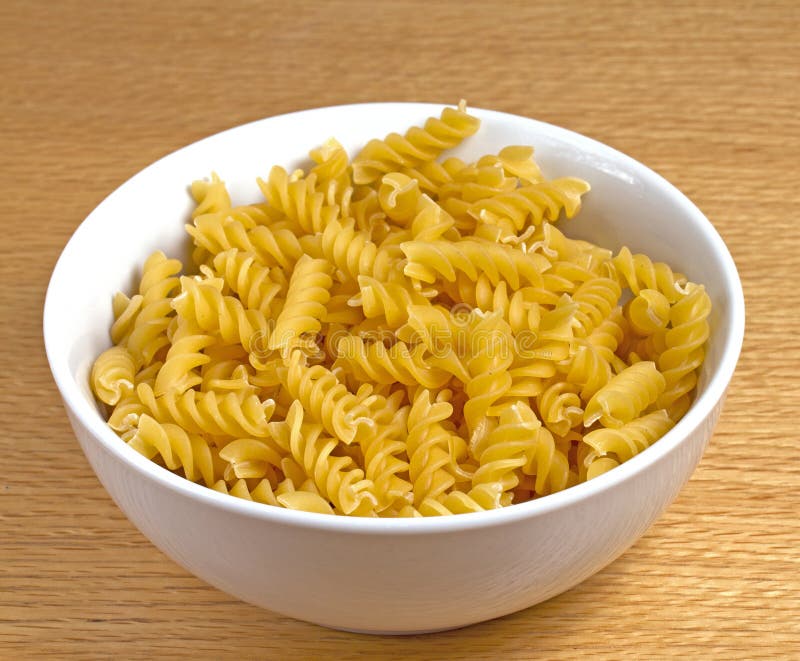 Bowl Of Uncooked Pasta Stock Photo Image 17710380 bowl-of-uncooked-pasta-stock-photo-image-17710380
