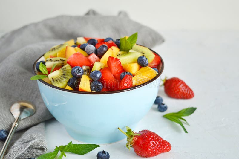 Bowl of Vegetarian Fresh Fruit Salad of Different Fruits: Banana, Kiwi ...