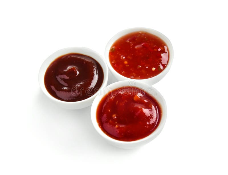 Bowls with barbecue and chili sauce on white background stock image Bowls with barbecue and chili sauce on white background stock image