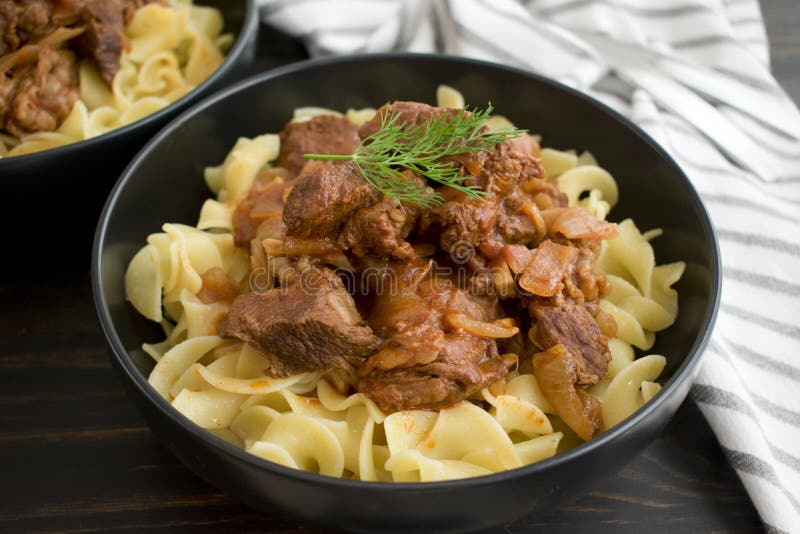 Hungarian Beef Goulash with Noodles Stock Photo - Image of herb, pasta