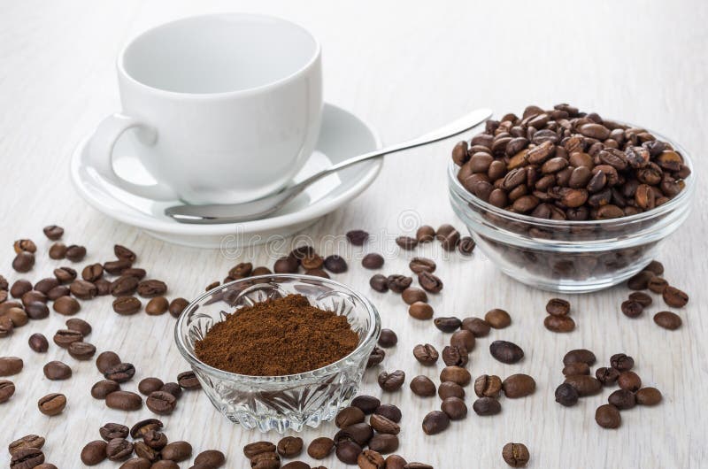 Bowls with Ground Coffee, Coffee Beans, Empty Cup, Spoon Stock Photo