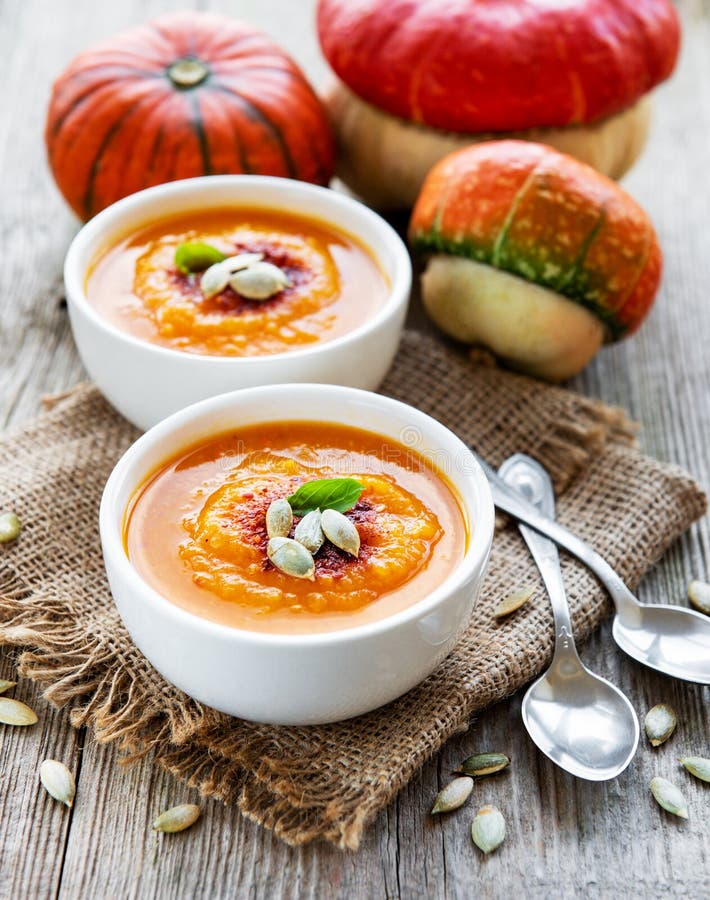 Bowls of pumpkin soup stock photo. Image of pumpkin 138893146