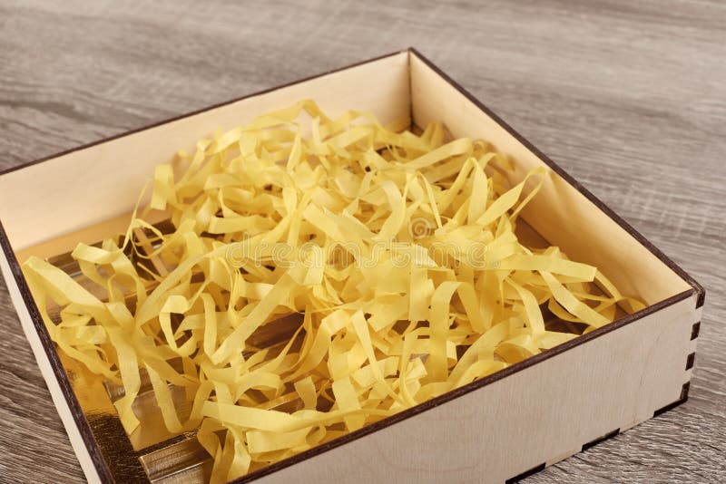 Box with decorative straw stock photos