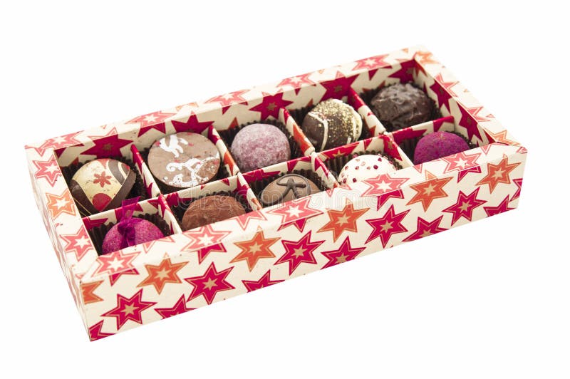 Box of pralines on white background