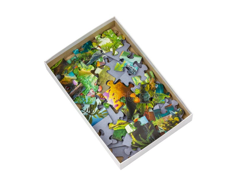 Box with puzzles on a white background. Children&x27;s puzzle. Isolate on white.