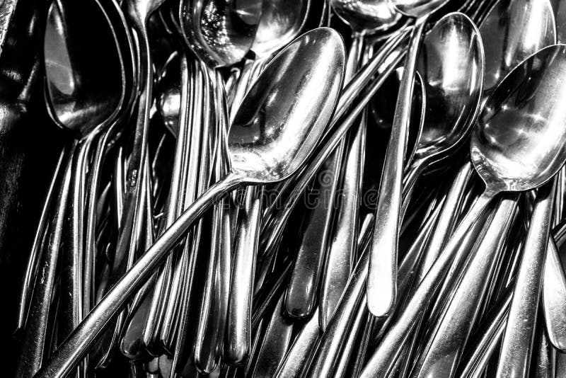 Box of Shining Spoons, Abstract Background of Sparkling Iron Spoons