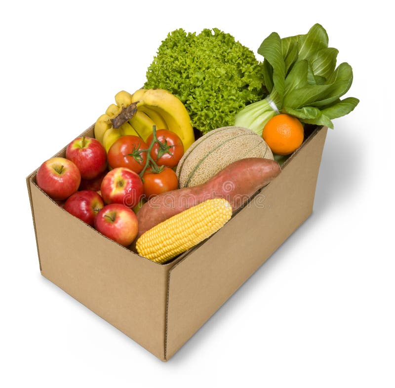 A cardboard box full of fruit and vegetables. A cardboard box full of fruit and vegetables