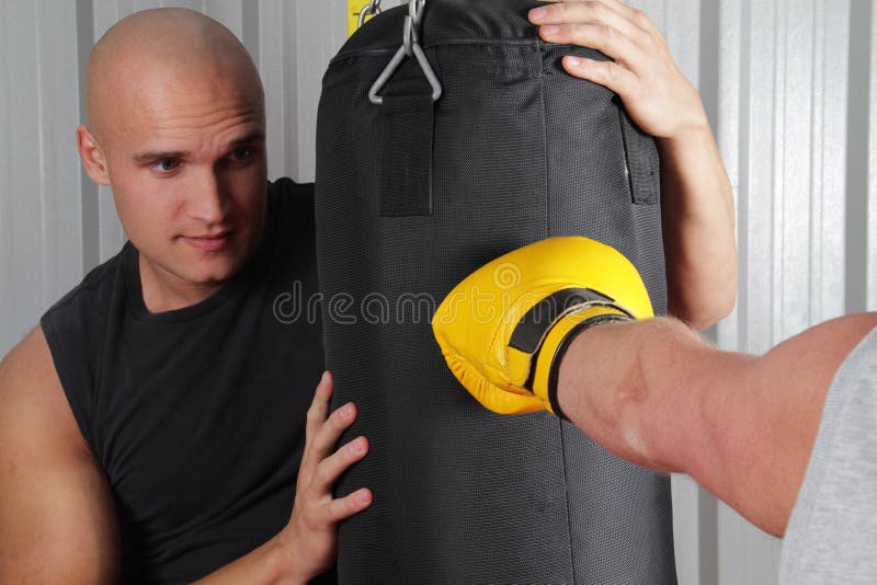 Boxer Hitting the Punch Bag Stock Photo Image of competition, boxing