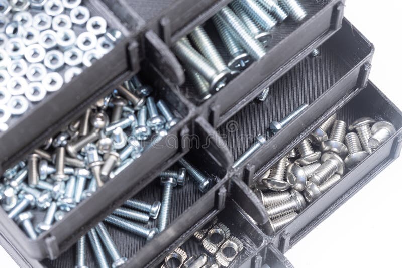 Boxes Full with Nuts and Bolts. Concept with Tool Box Stock