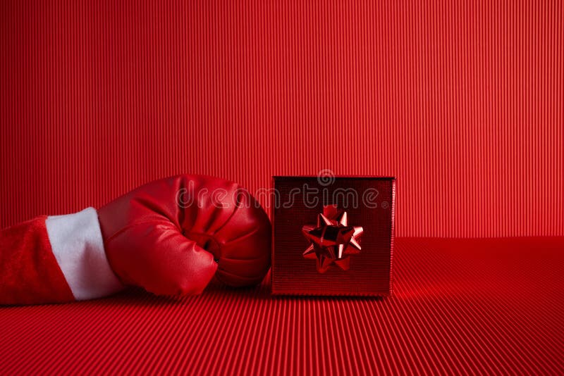 Boxing Day Shopping Creative Idea. Boxing Glove Coming Out of Gift Box